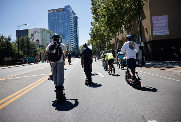 People head south on South Market Street during Viva CalleSJ's "Greetings from San Jose" in downtown San Jose, Calif., on Sunday, June 14, 2026. (Nhat V. Meyer/Bay Area News Group)