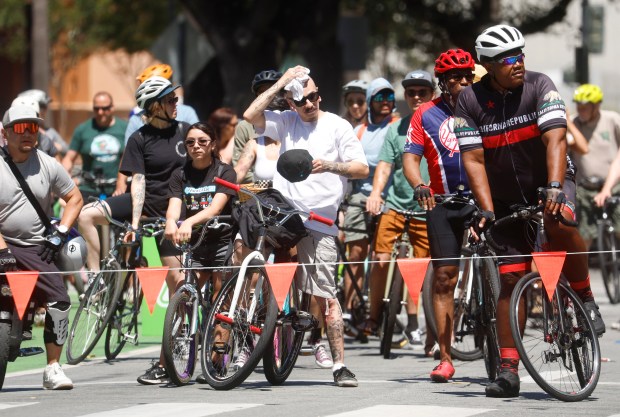 People wait to cross San Carlos Street while heading south on South Market Street during Viva CalleSJ's "Greetings from San Jose" in downtown San Jose, Calif., on Sunday, June 14, 2026. (Nhat V. Meyer/Bay Area News Group)