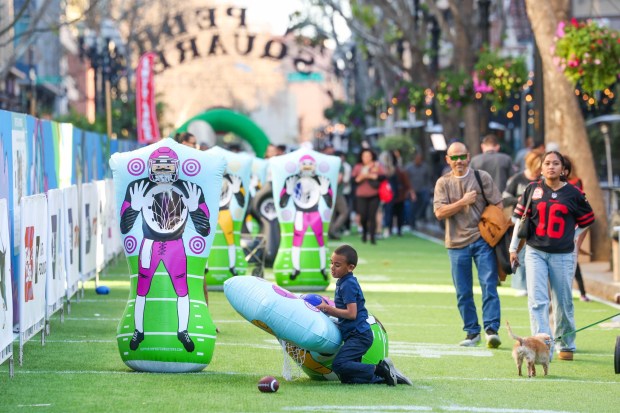 At San Pedro Square, the fan zone "activation" and inflatable fun will be switched to a soccer theme for the entire run of the World Cup. All restaurants and bars will be showing the matches. (Ray Chavez/Bay Area News Group)