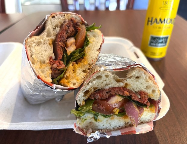 The merguez sandwich is pictured in May 2026 at Mozza Mocha in Oakland, Calif. (John Metcalfe/Bay Area News Group)(John Metcalfe/Bay Area News Group)