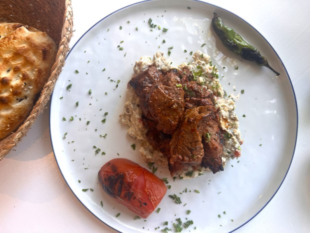 The mini lahmacun, a crispy flatbread with minced lamb and beef and fresh herbs and spices, is pictured in May 2026 at Bodrum Mezze and Cocktails in Dublin, Calif. (John Metcalfe/Bay Area News Group)