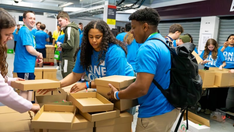 Young adults from across Europe gather in Burnley, England, on Saturday, May 30, 2026, to prepare six-month food supplies and assemble over 1,500 hygiene kits for three local charities that help women and children. The project was part of the One by One Young Single Adult Conference held May 29-31, 2026.