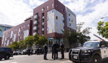 Officer opens fire on barricaded suspect in downtown San Diego