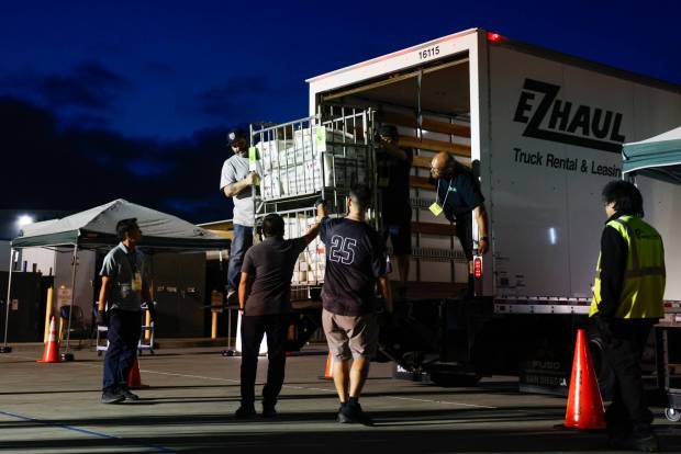 Ballots are unloaded off a truck at the Registrar of Voters on Tuesday, June 2, 2026 in San Diego, California. (Meg McLaughlin / The San Diego Union-Tribune)