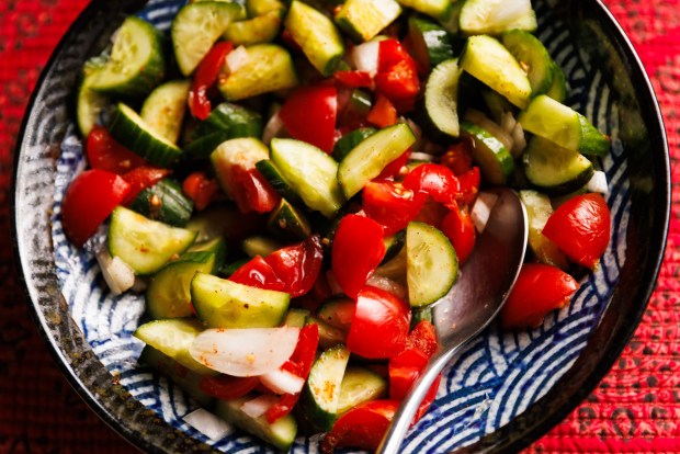 Fresh cucumber and tomatoes fill the spiced Desi Salad. (Kristian Carreon / The San Diego Union-Tribune)