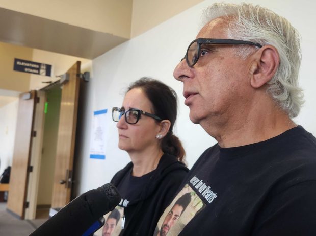 Hilda and Jack Harouni, parents of Dr. Benjamin Harouni, who was killed in a shooting, speak to reporters inside the El Cajon courthouse on Tuesday, June 23, 2026.. Their son, a dentist, was shot and killed in his office in February 2026. A former patient is accused of killing him and trying to kill others during a shooting spree inside the office. (Teri Figueroa/The San Diego Union-Tribune)