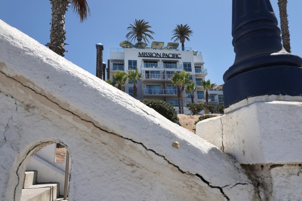 San Diego, CA 6_19_2026_Tax revenue and other benefits are coming to Oceanside courtesy of The Seabird, not shown and Mission Pacific, shown with cracking paint from the front of the Oceanside Pier. The hotels are the newest beachfront resort hotels just south of Oceanside Pier. (John Gastaldo / For The San Diego Union-Tribune)