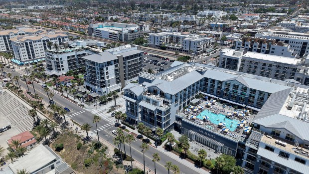 San Diego, CA 6_19_2026_Tax revenue and other benefits are coming to Oceanside courtesy of The Seabird, shown at right with pool, and Mission Pacific, left of Seabird. The hotels are the newest beachfront resort hotels just south of Oceanside Pier. (John Gastaldo / For The San Diego Union-Tribune)