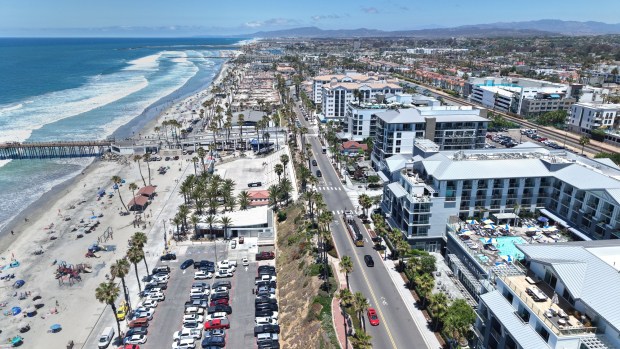 San Diego, CA 6_19_2026_Tax revenue and other benefits are coming to Oceanside courtesy of The Seabird, shown at right with pool, and Mission Pacific, left of Seabird,. The hotels are the newest beachfront resort hotels just south of Oceanside Pier. (John Gastaldo / For The San Diego Union-Tribune)