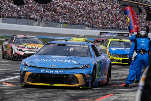 El Cajon native Jimmie Johnson moves to the pit during the NASCAR Daytona 500 auto race on Sunday, Feb. 15, 2026. Johnson is among the participants of an upcoming race in Coronado. (AP Photo/Nigel Cook)