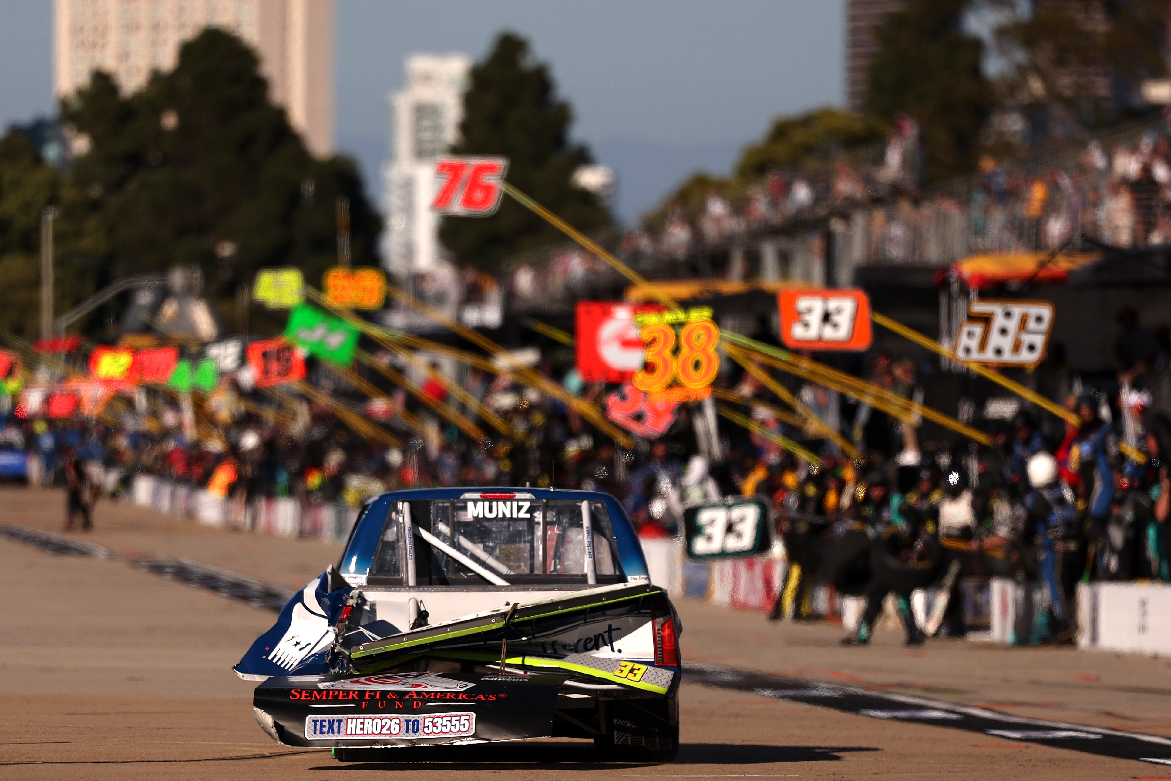 Frankie Muniz, driver of the #33 Lakeside Construction Ford, pits...