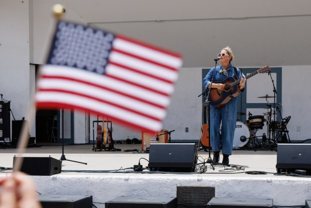 Singer Kim Johnson performs during the USA 250 festival in Oceanside on Saturday, June 27, 2026. (Kristian Carreon / The San Diego Union-Tribune)