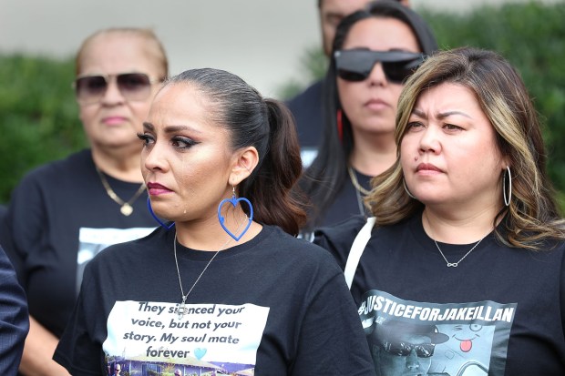 Vista, CA 6_4_26_ After the arraignment of Escondido police Officer Jason Ingco, charged in connection with the death of a suspect Jacob Illian during a chase on Aug. 21, 2025, Illian's family and friends gathered to speak to the media outside Vista Courthouse. HIs wife Merari Magallanes, left, shedding tears, and his sister Trisha Gonzalez were present at the press conference. Photo by John Gastaldo for the Union-Tribune
