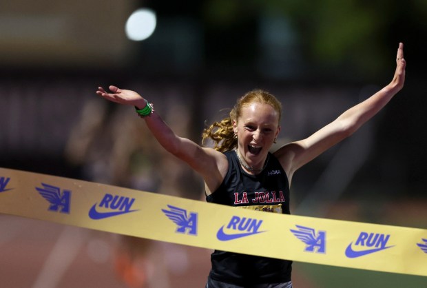 La Jolla's Chiara Dailey celebrates while winning the girls one mile run invitational during the Arcadia Invitational at Arcadia High School on Saturday, April 11, 2026. (Photo by Trevor Stamp, Contributing Photographer)