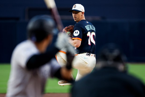 Walker Buehler #10 of the San Diego Padres pitches against the Colorado Rockies during the first inning at Petco Park on Friday, April 10, 2026 in San Diego, California. (Meg McLaughlin / The San Diego Union-Tribune)