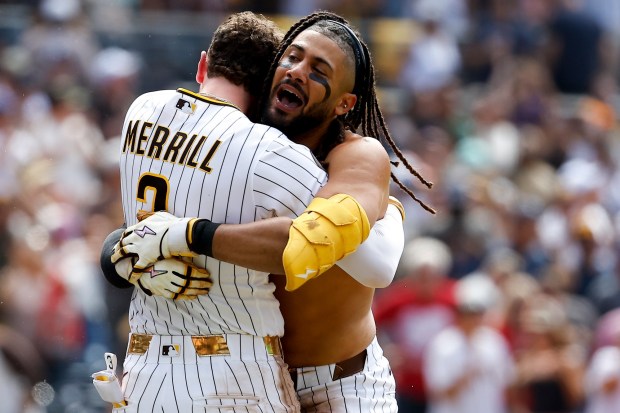 Jackson Merrill #3 and Fernando Tatis Jr. #23 of the San Diego Padres celebrate after a walk-off home run against the Cincinnati Reds during the ninth inning at Petco Park on Wednesday, June 10, 2026 in San Diego, California. (Meg McLaughlin / The San Diego Union-Tribune)