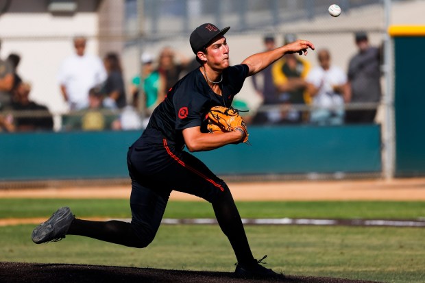 Huntington Beach's Jared Grindlinger #28 pitches against Patrick Henry during the Southern California Regional baseball playoffs at Patrick Henry High School on Tuesday, June 2, 2026 in San Diego, California. (Meg McLaughlin / The San Diego Union-Tribune)