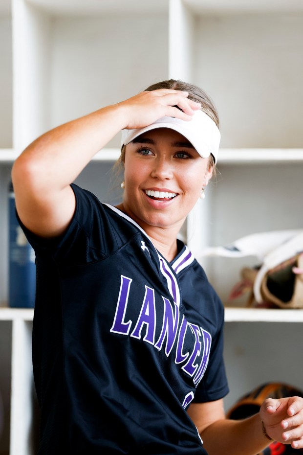 Carlsbad High School center fielder Gabriela Nevarez smiles with teammates after scoring a run against Del Norte at Carlsbad High School on Friday, April 3, 2026 in Carlsbad, California. (Meg McLaughlin / The San Diego Union-Tribune)