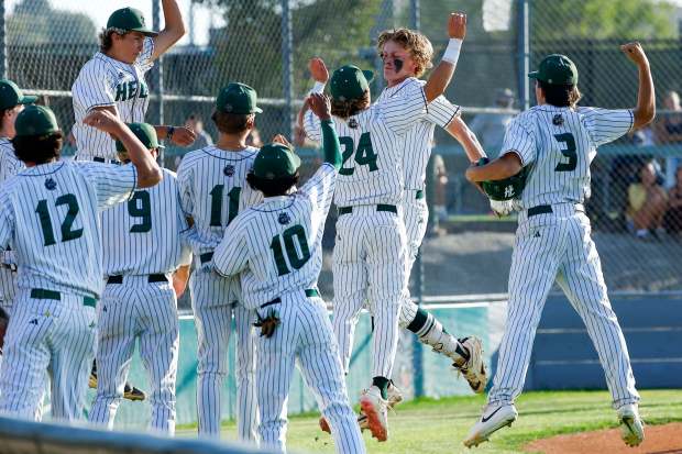 Helix's Ben Williams #1 and teammates celebrate after his home run against Kaiser during the CIF Southern California Regional semifinals at Helix High School on Wednesday, June 3, 2026 in San Diego, California. (Meg McLaughlin / The San Diego Union-Tribune)
