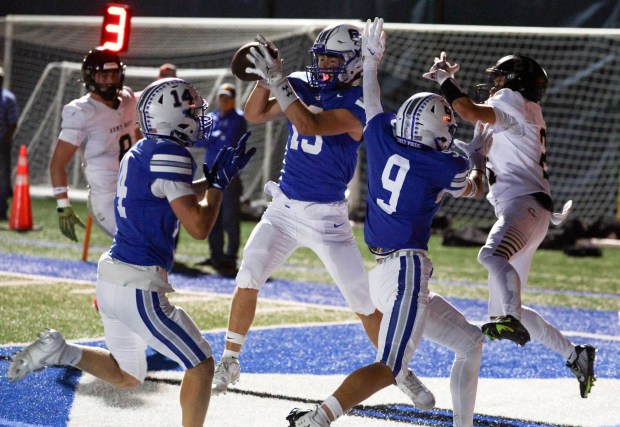 La Jolla Country Day's James Picinich catches a pass intended for an Army-Navy receiver for an interception in the end zone in the first quarter at La Jolla Country Day School in La Jolla on Friday, Sept. 19, 2025. (Hayne Palmour IV / For The San Diego Union-Tribune)