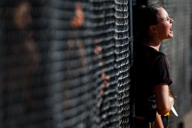 Point Loma's Zibby Baker cheers in the dugout during the CIF Southern California Division 1 Regional semifinals against Mater Dei at Mater Dei Catholic High School on Thursday, June 4, 2026 in Chula Vista, California. (Meg McLaughlin / The San Diego Union-Tribune)