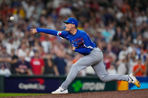 Italy pitcher Ron Marinaccio (97) throws in the eighth inning of a World Baseball Classic game against the United States , Tuesday, March 10, 2026, in Houston. (AP Photo/Ashley Landis)