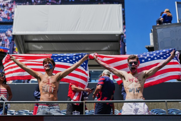 United States fans celebrate after the World Cup Group D soccer match between United States and Australia in Seattle, Friday, June 19, 2026. (AP Photo/Manu Fernandez)