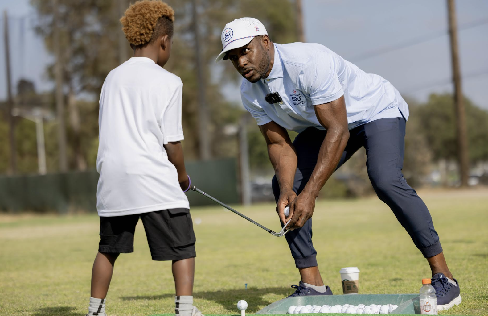 'Golf is a game of life': Football legend Reggie Bush takes to the course to mentor young players