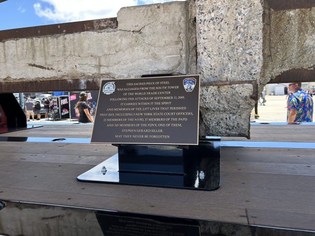 Sign explaining the significance of steel beam from South Tower. (Kirk Kenney / San Diego Union-Tribune)