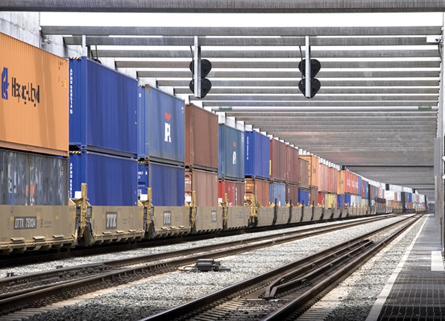 Undated post-2002 photo shows a train loaded with containers traveling...