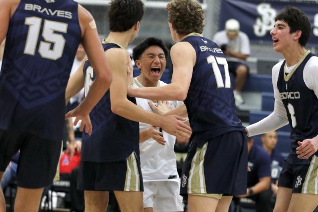 St. John Bosco libero Jaiden Gutierrez, center, reacts after scoring a point in boys volleyball action against Redondo Union on Wednesday, Mar. 11, 2026, at St. John Bosco High School in Bellflower. (Photo by Howard Freshman, Contributing Photographer)