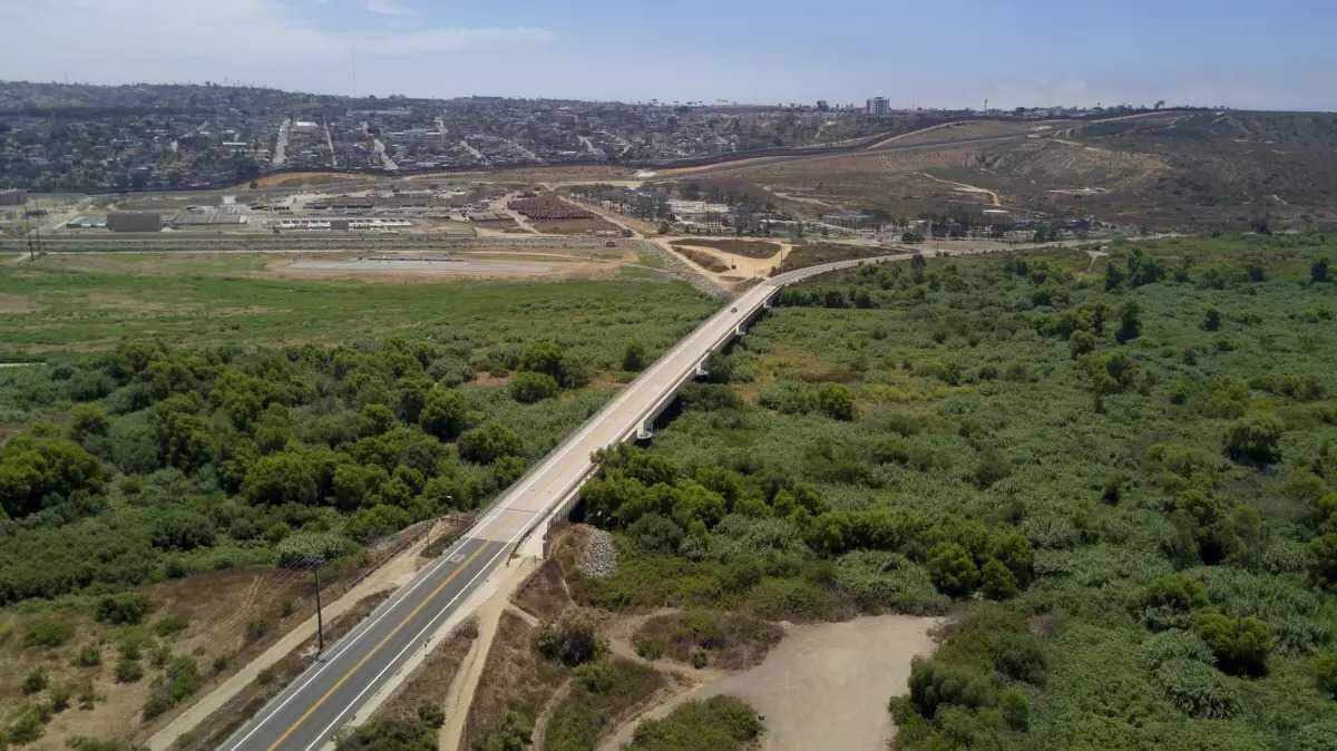 A section the Tijuana River in south San Diego County with the U.S.-Mexico border in the background. A nonprofit’s report lists the binational waterway as the ninth-most endangered river in America. A section the Tijuana River in south San Diego County with the U.S.-Mexico border in the background. A nonprofit’s report lists the binational waterway as the ninth-most endangered river in America.