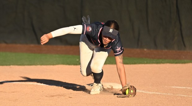 Tank Marok of North Farmington (62) scoops up the ball at first base for the OAA during Tuesday's MAC-OAA All-Star Game at Oakland University on June 23, 2026. (DAN STICKRADT -- MediaNews Group)