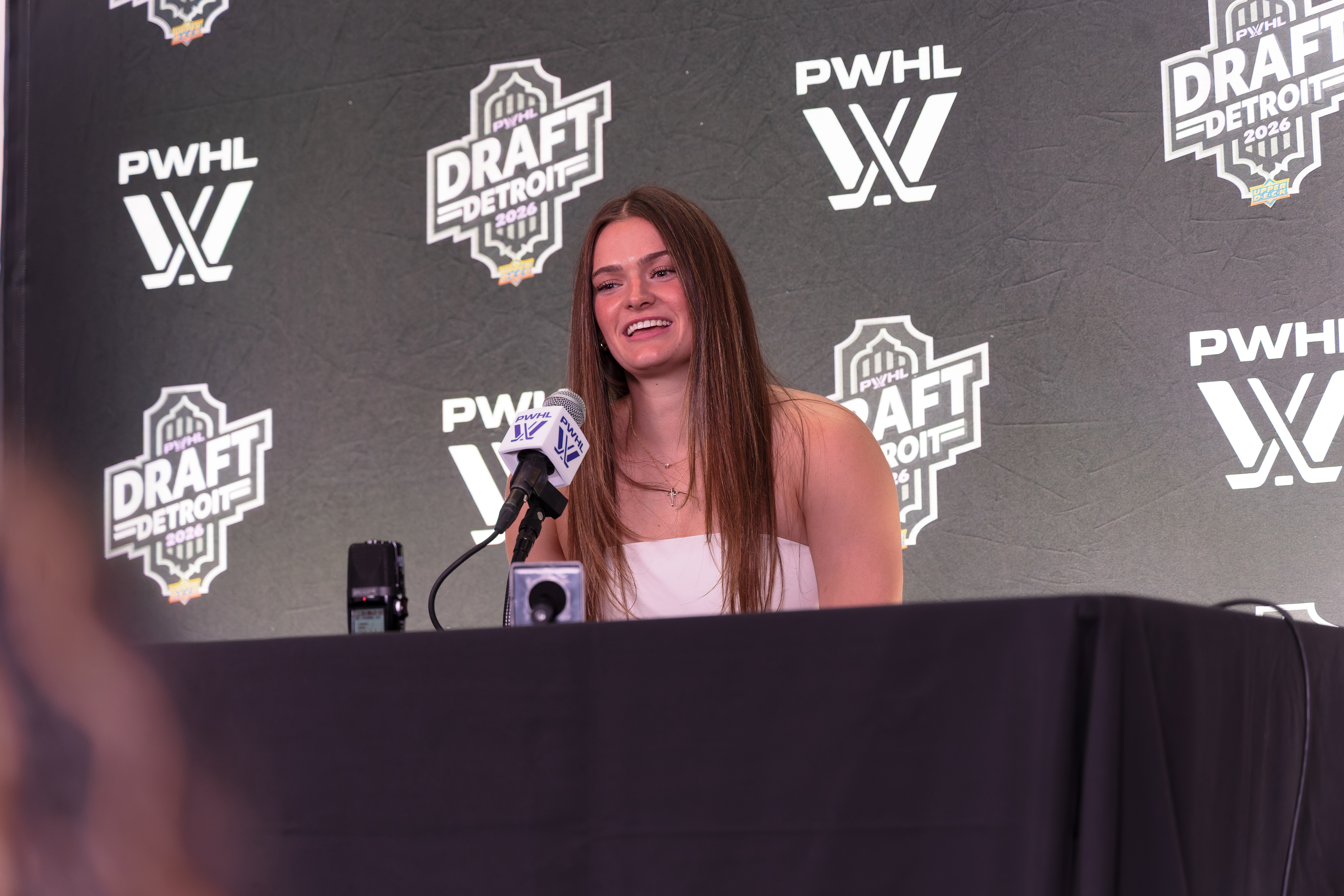 The Ohio State University's Emma Peschel addresses the media after...
