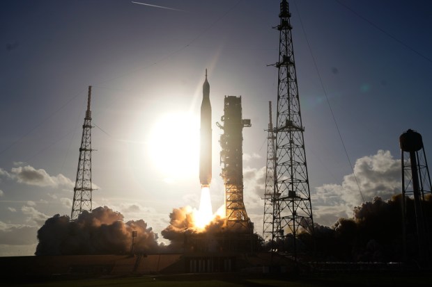 The NASA Artemis II SLS (Space Launch System) rocket with the Orion spacecraft launches at the Kennedy Space Center, Wednesday, April 1, 2026, in Cape Canaveral, Fla. (AP Photo/John Raoux)