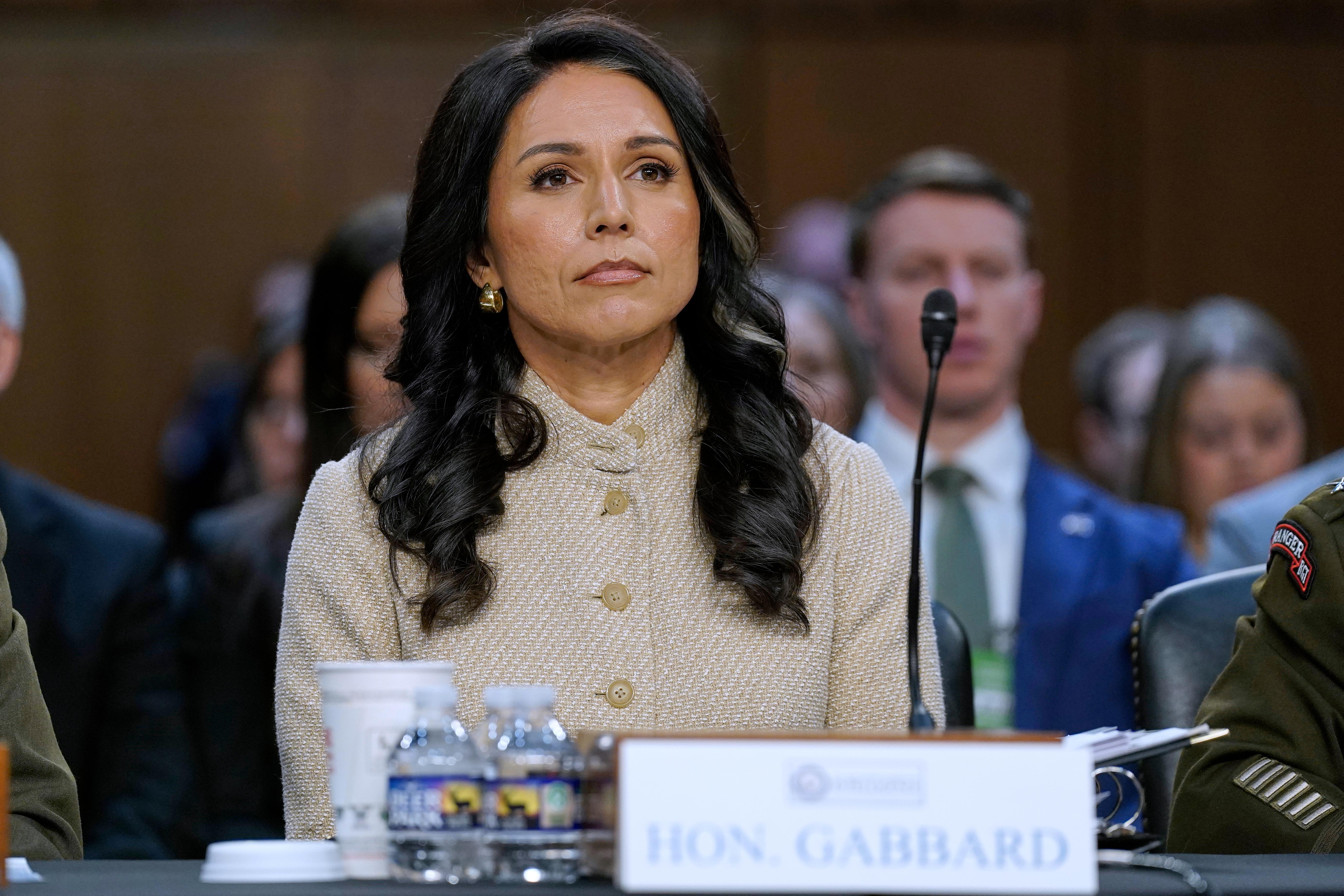 Director of National Intelligence Tulsi Gabbard listens during a Senate hearing.
