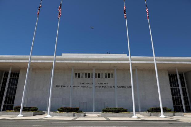 A plane flies over the John F. Kennedy Center for the Performing Arts, Thursday, June 4, 2026, in Washington. (AP Photo/Rahmat Gul)