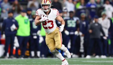 Jan 17, 2026; Seattle, WA, USA; San Francisco 49ers running back Christian McCaffrey (23) runs after the catch against the Seattle Seahawks during the first half in an NFC Divisional Round game at Lumen Field.