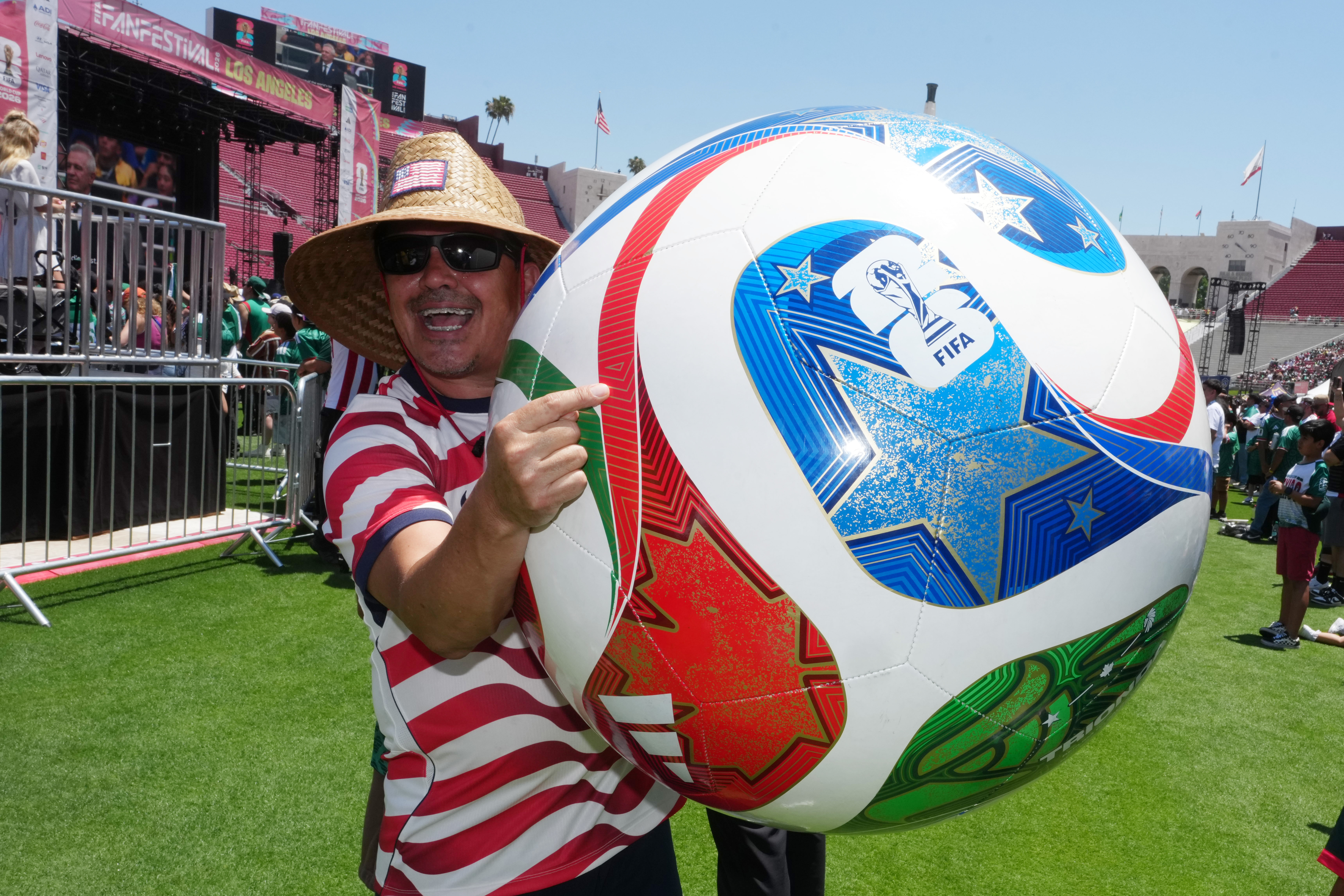 Jun 11, 2026; Los Angeles, California, USA; A USA fan poses during the 2026 FIFA World Cup Fan Festival at Los Angeles Memorial Coliseum. Mandatory Credit: Kirby Lee-Imagn Images
