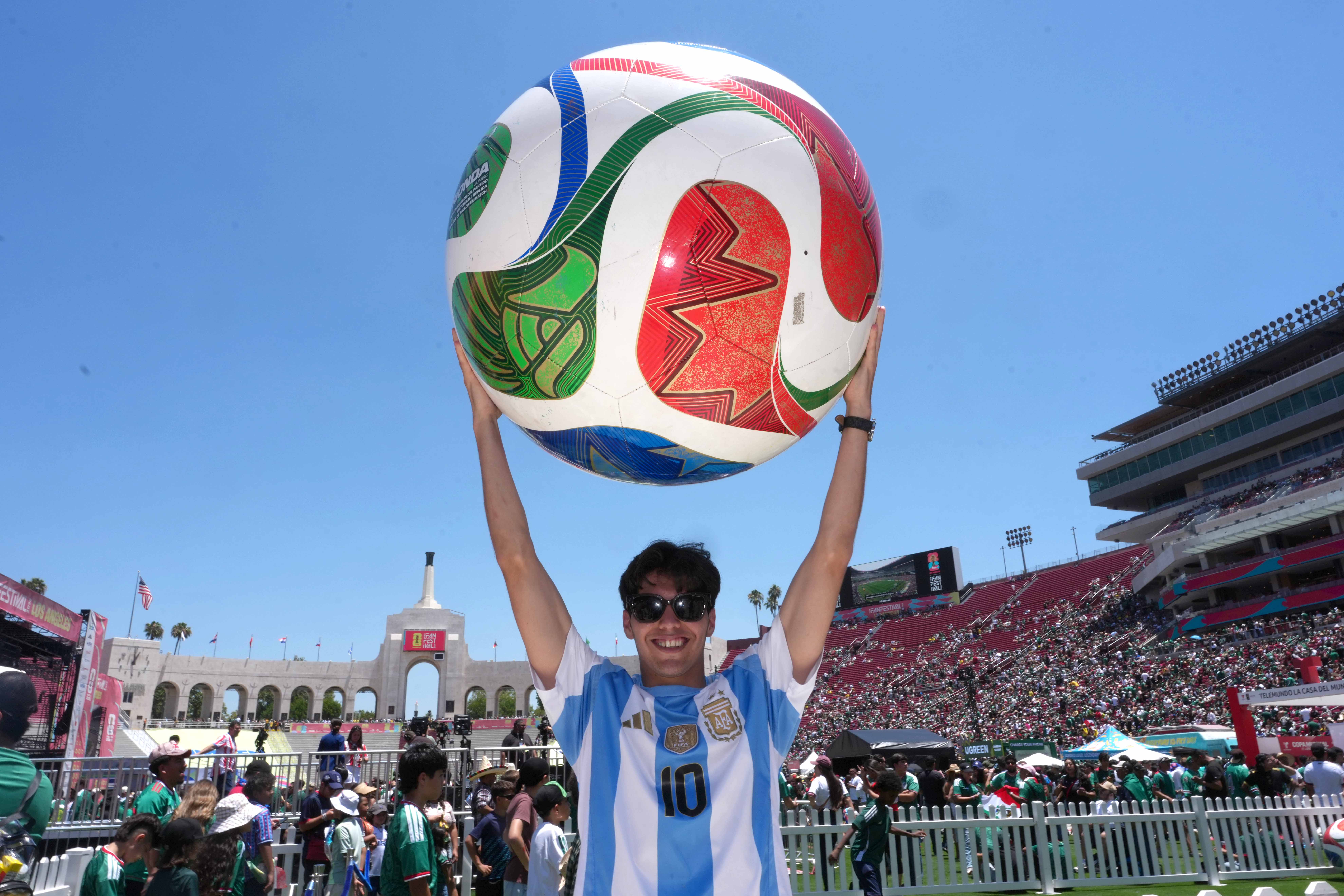Jun 11, 2026; Los Angeles, California, USA; An Argentina fan poses during the 2026 FIFA World Cup Fan Festival at Los Angeles Memorial Coliseum. Mandatory Credit: Kirby Lee-Imagn Images