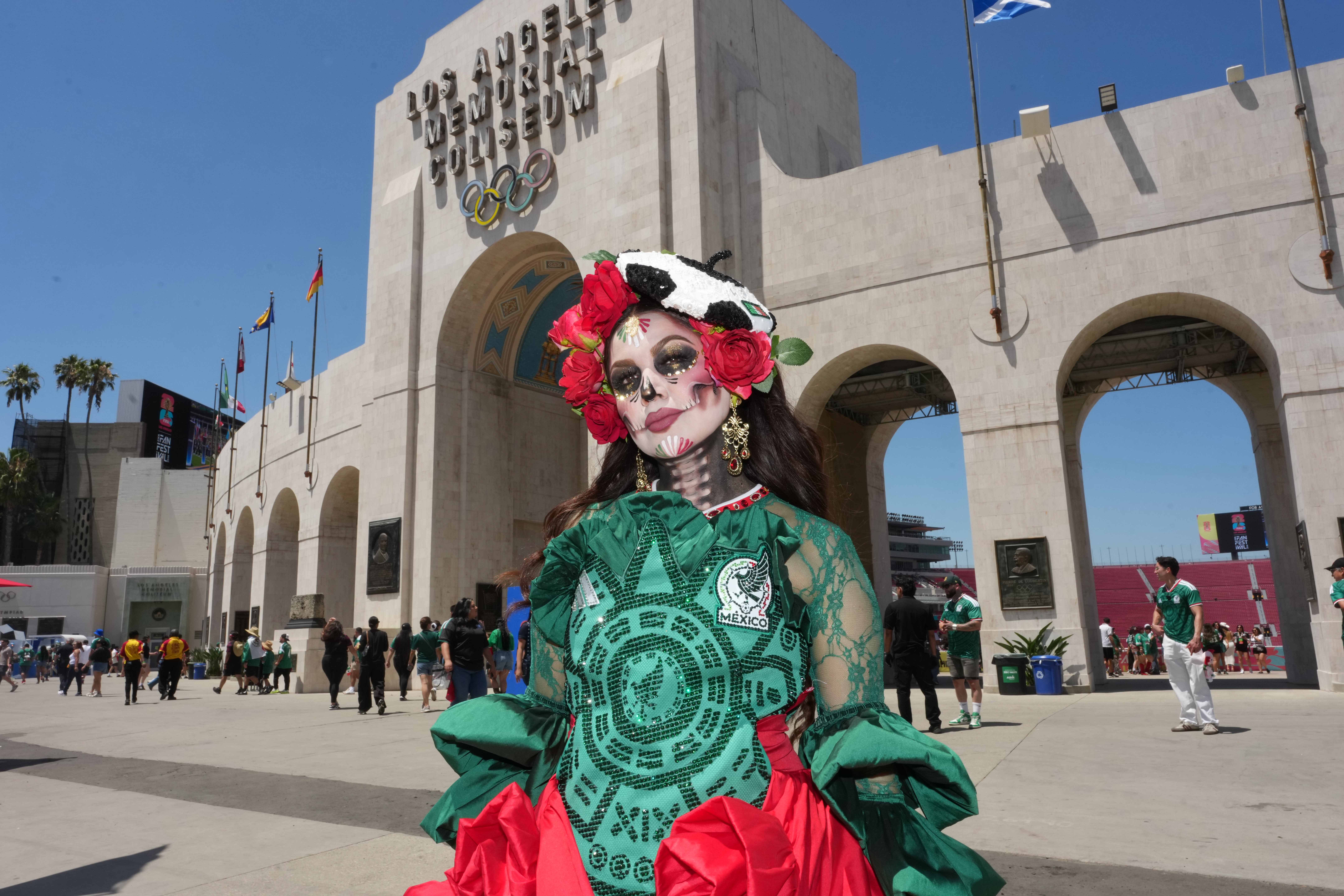 Jun 11, 2026; Los Angeles, California, USA; A Mexico female fan poses during the 2026 FIFA World Cup Fan Festival at Los Angeles Memorial Coliseum. Mandatory Credit: Kirby Lee-Imagn Images