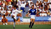 Jul 24, 1992; Barcelona, SPAIN; FILE PHOTO; Claudio Reyna (USA) (10) in action against Joe Max Moore (ITA) (13) during the 1992 Barcelona Olympic Games at Camp Nou. Mandatory Credit: George Long-USA TODAY NETWORK