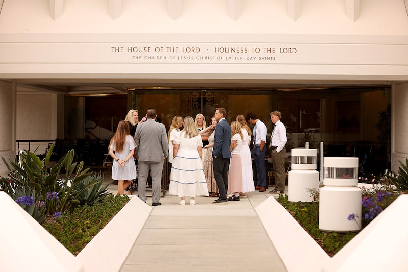 People gather in front of the San Diego California Temple for media day on Monday, June 15, 2026.
