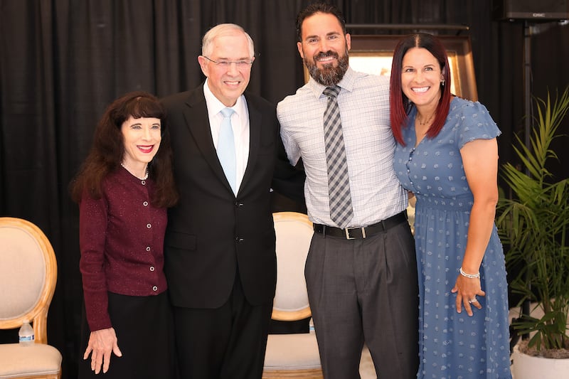 Elder Neil L. Andersen and Sister Kathy Andersen take a picture with Eric Weddle and Chanel Weddle during media day at the San Diego California Temple on Monday, June 15, 2026.