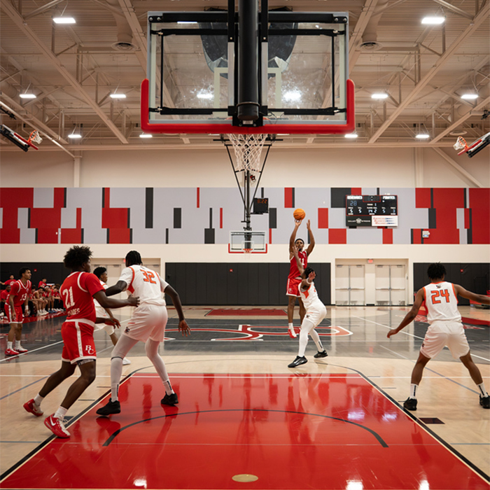 basketball player takes a shot during a live game