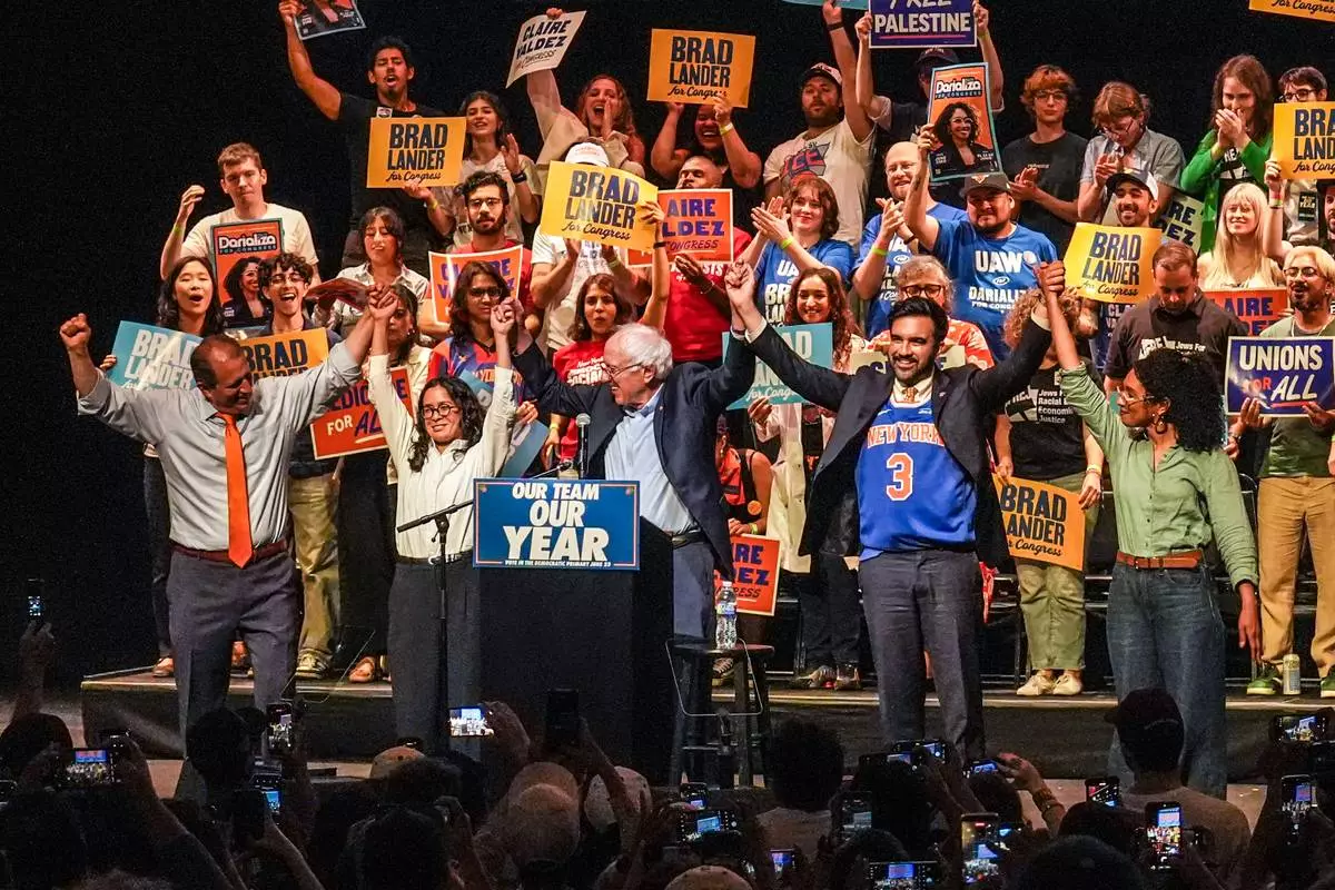 From left, Democratic congressional candidates Brad Lander, Claire Valdez, Sen. Bernie Sanders, I-VT., Mayor Zohran Mamdani and candidate Darializa Avila Chevalier gesture on stage during a Get Out The Vote rally ahead of New York's primary election, Thursday, June 18, 2026, in the Brooklyn borough of New York. (AP Photo/Ryan Murphy)