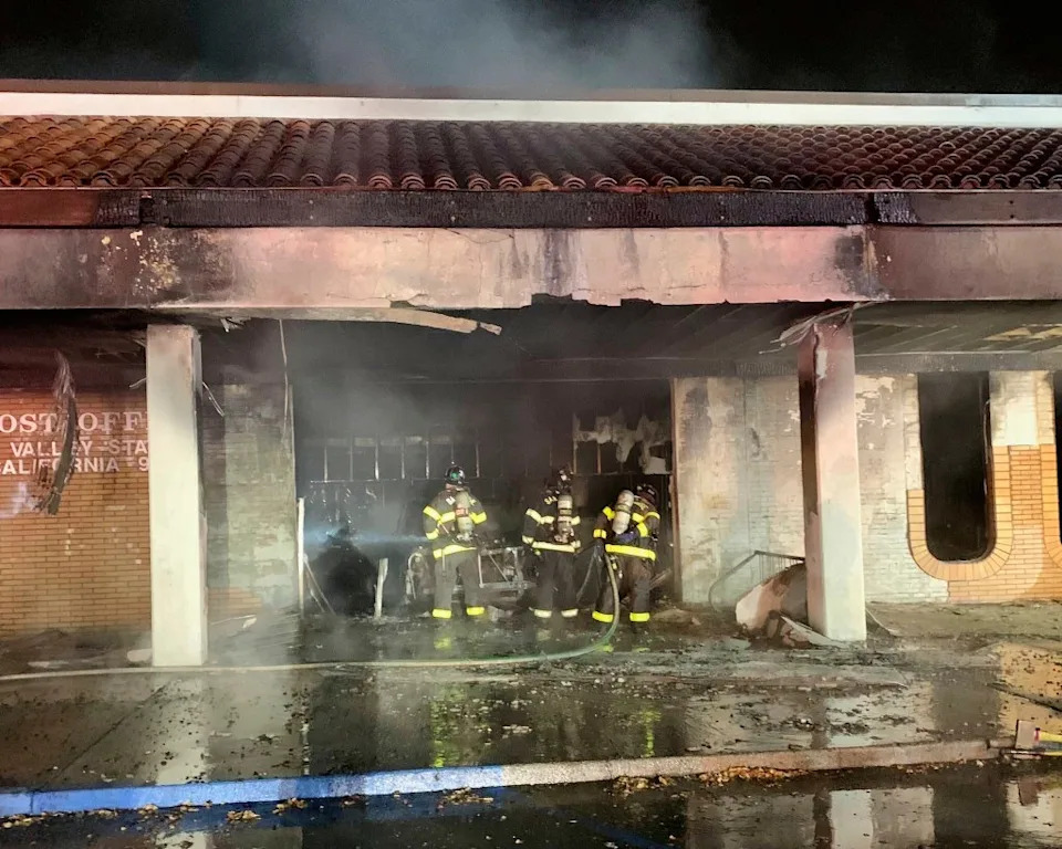 The lobby of the post office quickly went up in flames, completely destroying the space. AP