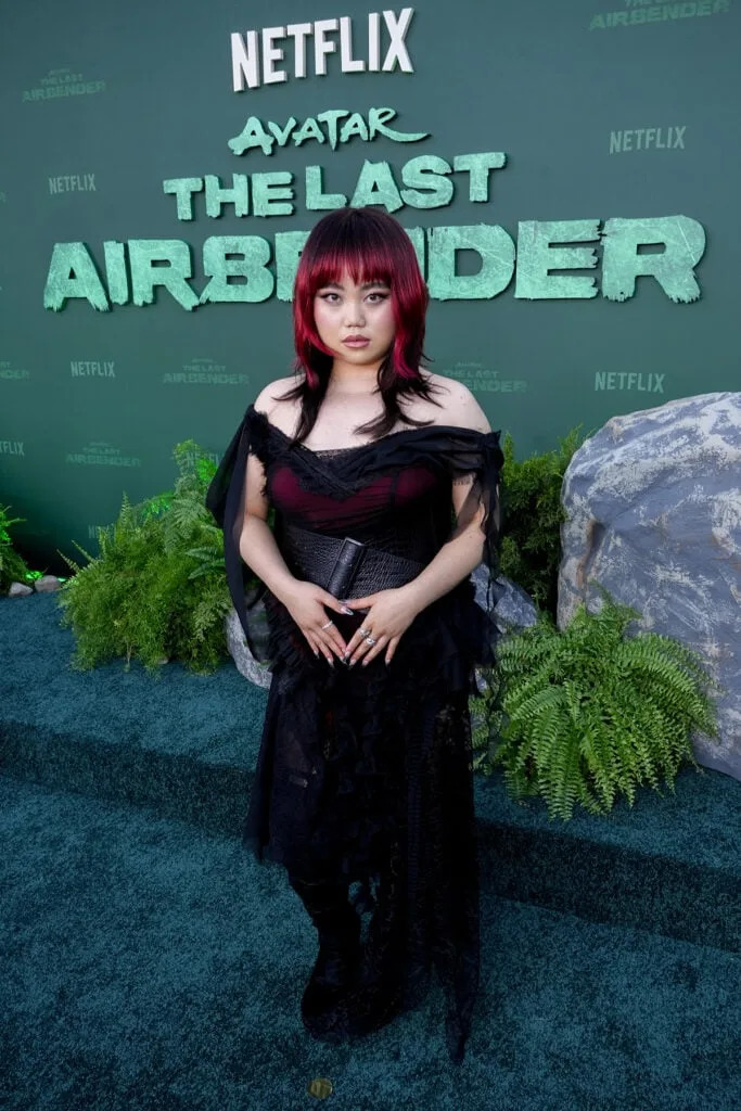 Thalia Tran attends the Avatar: The Last Airbender Season 2 premiere wearing a black layered corseted look.