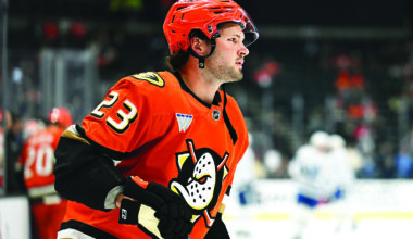 Blues acquire McTavish for draft picks