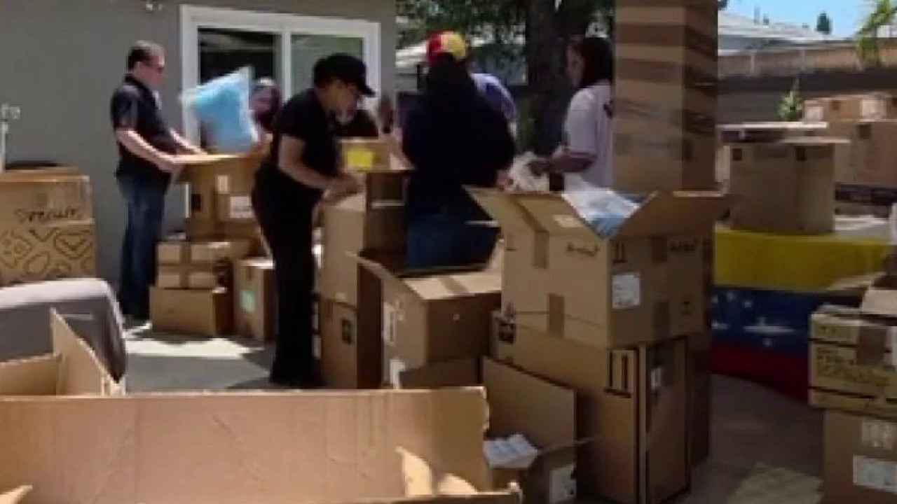 Volunteers collect donations for Venezuela
